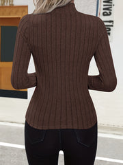 The slim fitting cutout knit top